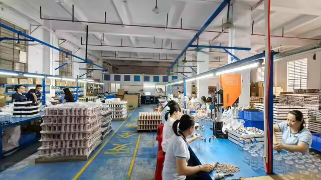 Production line workers checking goods