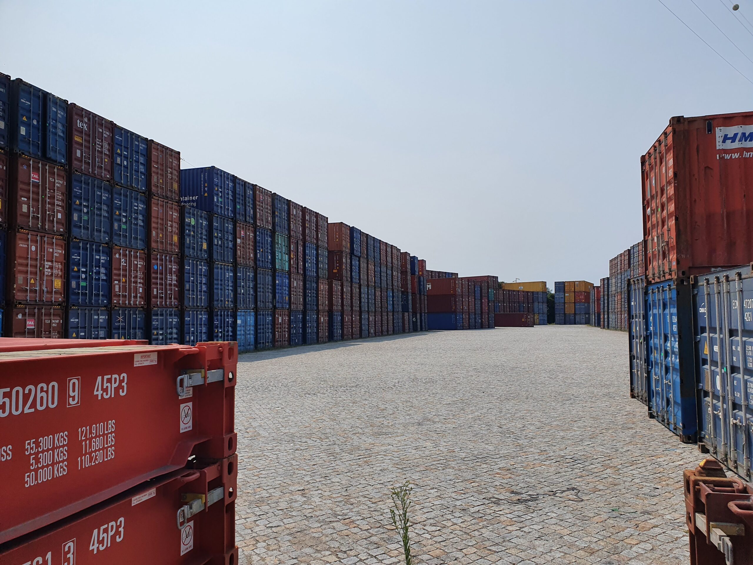 Container depot with stacked shipping containers for GCC distributors importing from China